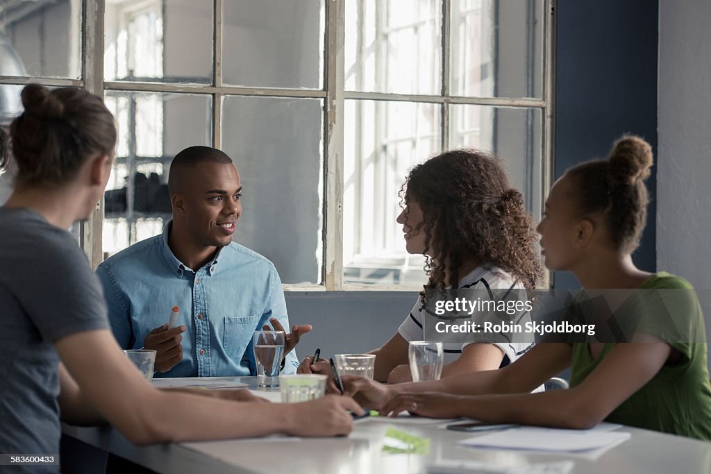 Young people having meeting