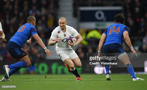 England's Mike Brown runs at the France defence during the RBS 6 Nations match between England and France at Twickenham Stadium in London, UK. Photo:...