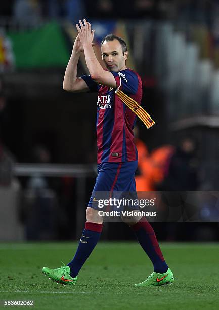 Andres Iniesta of Barcelona applauds the fans as he leaves the pitch during the La Liga match between Barcelona and Real Madrid at the Estadio Camp...