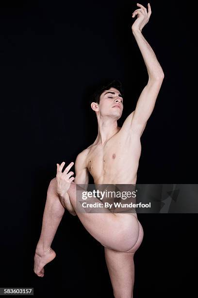 nude male ballet dancer posing with his leg up - male bum fotografías e imágenes de stock