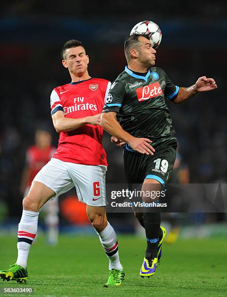 Laurent Koscielny of Arsenal and Goran Pandev of Napoli during the UEFA Champions League Group F match between Arsenal and SSC Napoli at the Emirates...