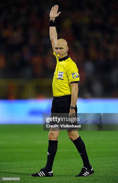 Referee Sergey Karasev of Russia during the FIFA 2014 World Cup Qualifying Group A match between Belgium and Wales at the King Baudouin Stadium in...