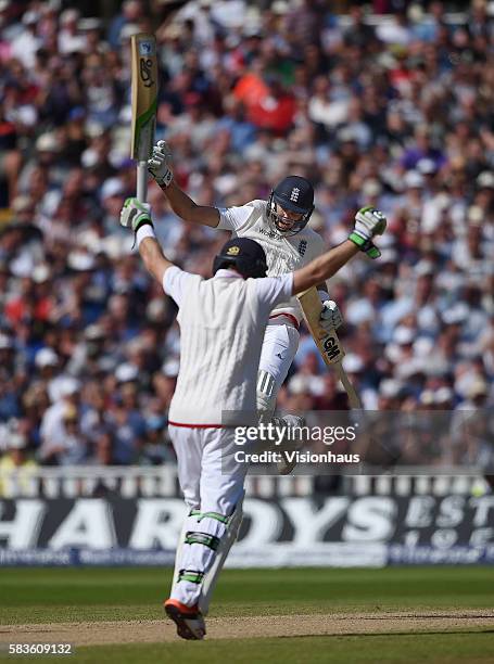Joe Root and Ian Bell celebrate as England beat Australia during the third day of the 3rd Investec Ashes Test between England and Australia at...