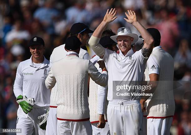 Ben Stokes celebrates as England take the wicket of David Warner during the second day of the 3rd Investec Ashes Test between England and Australia...