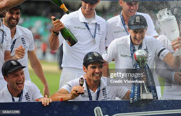England Captain Alastair Cook and Joe Root celebrate winning The Ashes during the fourth day of the 5th Investec Ashes Test between England and...