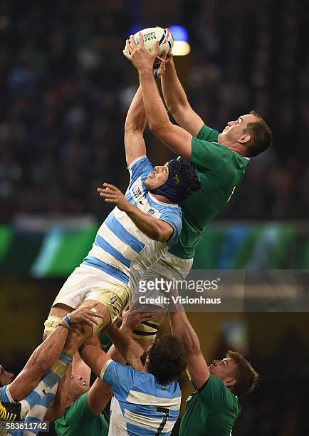 Tomas Lavanni of Argentina and Devin Toner of Ireland battle for a line out during the Rugby World Cup quarter final match between Ireland and...