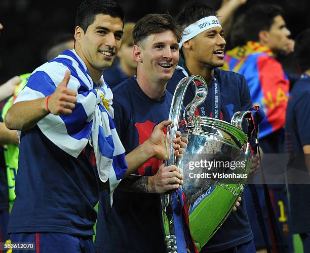 Luis Suárez, Lionel Messi and Neymar celebrate winning the UEFA Champions League Final between Barcelona and Juventus at the Olympic Stadium in...