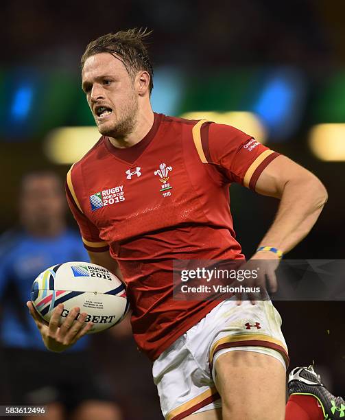 Cory Allen of Wales runs through to score a try during the Rugby World Cup pool A group match between Wales and Uruguay at the Millennium Stadium in...