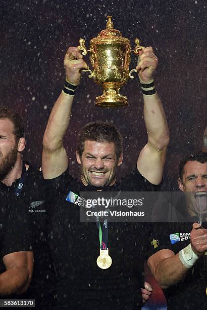 New Zealand's captain, Richie McCaw holds the trophy aloft after winning the Rugby World Cup Final between New Zealand and Australia at the...