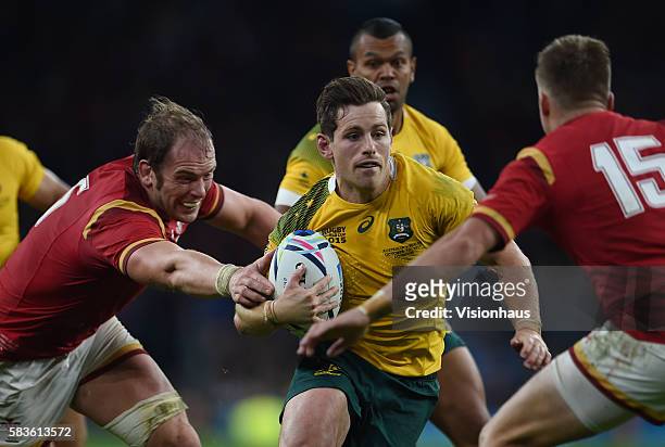 Bernard Foley of Australia and Alun Wyn Jones and Gareth Anscombe of Wales during the Rugby World Cup 2015 Group A match between Australia and Wales...