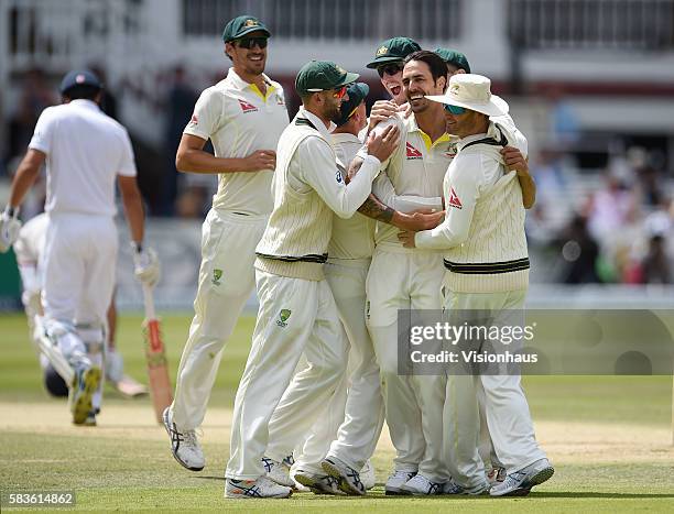 Australia's Mitchell Johnson celebrates taking the wicket of Alastair Cook during the fourth day of the 2nd Investec Ashes Test between England and...