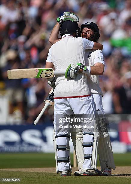 Ian Bell and Joe Root celebrate as England beat Australia during the third day of the 3rd Investec Ashes Test between England and Australia at...