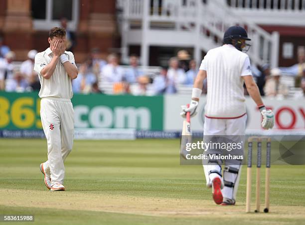 Matt Henry of New Zealand reacts after being hit for four by England's Joe Root during the 4th Day of the 1st Investec Test Match between England and...