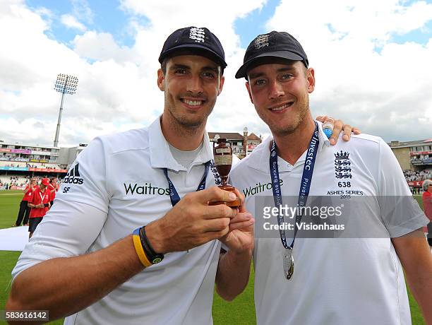 Steven Finn and Stuart Broad of England celebrate winning The Ashes during the fourth day of the 5th Investec Ashes Test between England and...