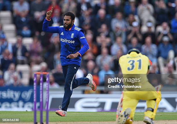 Adil Rashid of England celebrates taking the wicket of David Warner during the 1st ODI of the Royal London ODI Series between England and Australia...