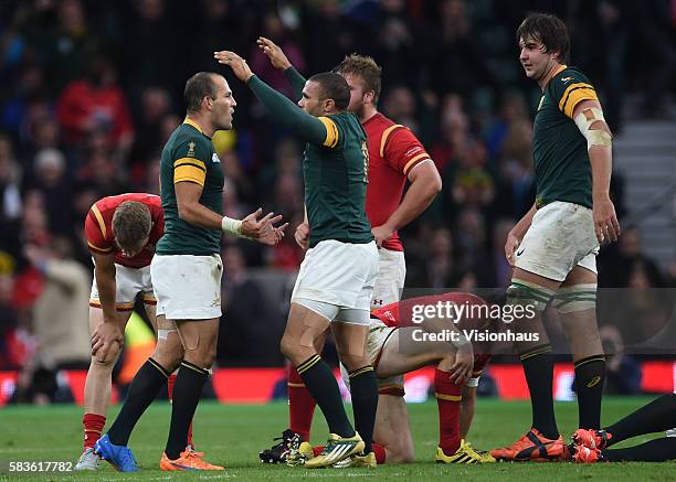 Bryan Habana and Fourie du Preez of South AFrica celebrate victory over Wales during the Rugby World Cup 2015 Quarter-Final match between South...