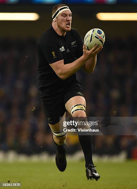 Brodie Retallick of New Zealand runs through to score a try during the Rugby World Cup quarter final match between New Zealand and France at the...