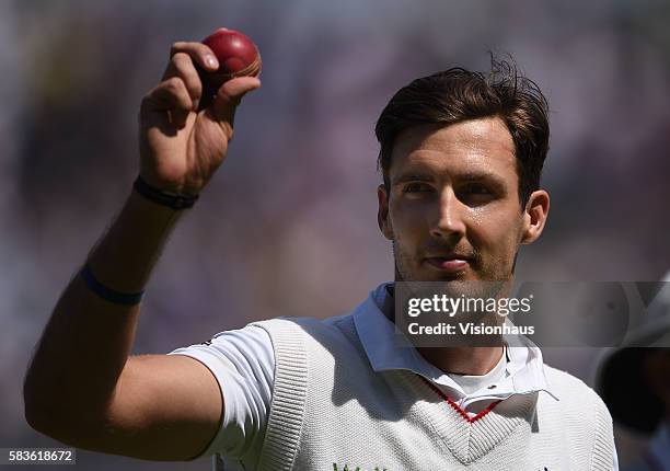 Steven Finn shows off the match ball as England bowl out Australia during the third day of the 3rd Investec Ashes Test between England and Australia...