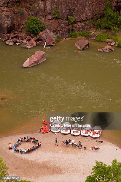 campsite and rafts on bank of green river in canyon - dinosaur national monument stock pictures, royalty-free photos & images