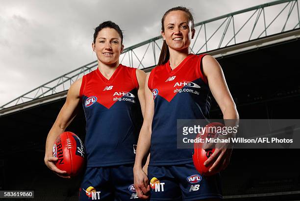 Melissa Hickey and Daisy Pearce of the Demons pose for a photograph during the Women's League marquee player announcement on July 27, 2016 in...