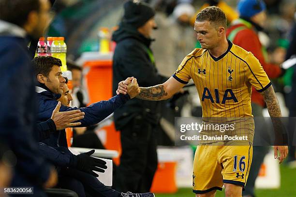 Tottenham Manager Mauricio Pochettino and Kieran Trippier shake hands during the 2016 International Champions Cup match between Juventus FC and...