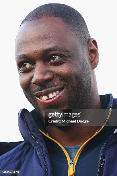 Retired Spurs captain Ledley King reacts when speaking to media during a Tottenham Hotspur player visit to the Hawthorn Hawks AFL team at Waverley...