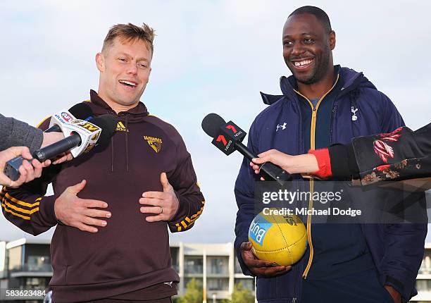 Retired Spurs captain Ledley King poses with Sam Mitchell of the Hawks speak to media during a Tottenham Hotspur player visit to the Hawthorn Hawks...