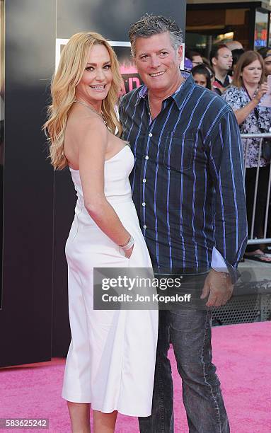 Taylor Armstrong and husband John H. Bluher arrive at the Los Angeles Premiere "Bad Moms" at Mann Village Theatre on July 26, 2016 in Westwood,...