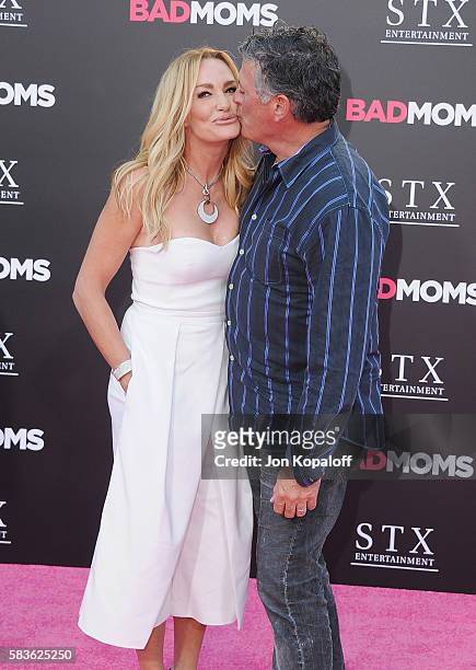 Taylor Armstrong and husband John H. Bluher arrive at the Los Angeles Premiere "Bad Moms" at Mann Village Theatre on July 26, 2016 in Westwood,...