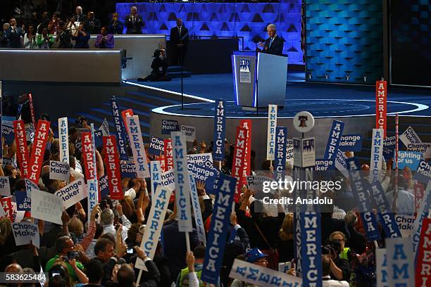 Democratic Party supporters hold banners at Wells Fargo Center during a speech of the former President Bill Clinton, in support of the Democratic...