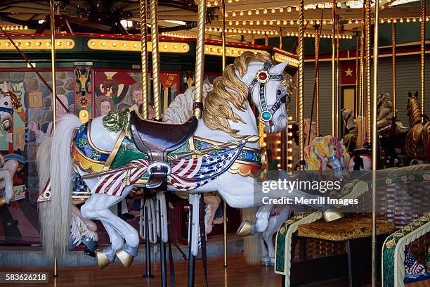 caras park carousel - carousel horses stock-fotos und bilder