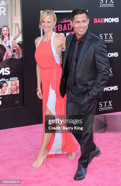 Actor Jay Hernandez and Daniella Deutscher attend the premiere of STX Entertainment's' 'Bad Moms' at Mann Village Theatre on July 26, 2016 in...