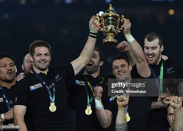 Captain Richie McCaw and Dan Carter lift the William Webb Ellis Cup as New Zealand win the 2015 Rugby World Cup Final between New Zealand and...