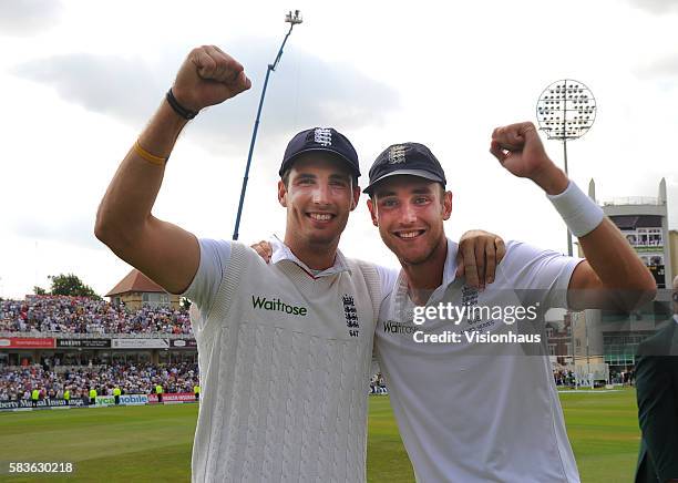 Steven Finn and Stuart Broad celebrate winning the match and regaining The Ashes during the third day of the 4th Investec Ashes Test between England...