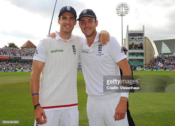 Steven Finn and Stuart Broad celebrate winning the match and regaining The Ashes during the third day of the 4th Investec Ashes Test between England...