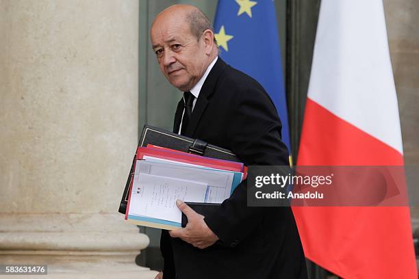 French Defence Minister Jean-Yves Le Drian arrives at the Elysee Palace for the meeting with French President Francois Hollande and French...