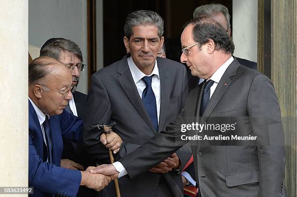 French President, Francois Hollande speaks with Paris Mosque Rector Dalil Boubakeur after the meeting with the representatives of religions at Elysee...