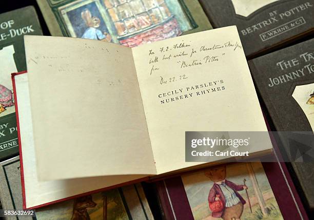 Signed first edition of Cecily Parsley's Nursery Rhymes by Beatrix Potter is displayed at Dreweatts and Bloomsbury Auctions on July 27, 2016 in...