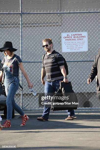 Jack Osbourne and his wife Lisa Stelly are seen on July 26, 2016 in Los Angeles, California.