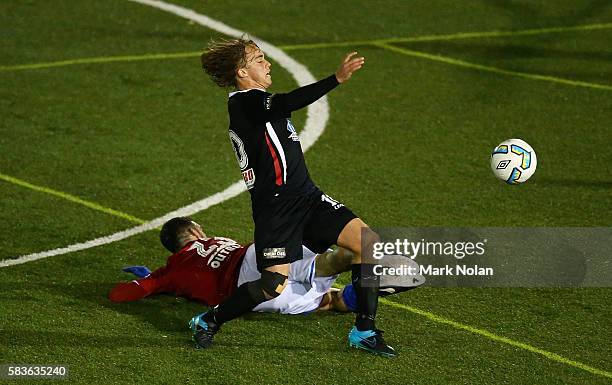 Panagiotis Nikas of Sydney United 58 FC tackles Connor Evans of Blacktown during the FFA Cup round of 32 match between Blacktown City and Sydney...
