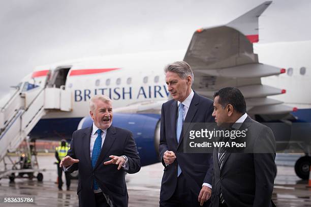 Declan Collier CEO of London City Airport, Chancellor Phillip Hammond and Minister for Aviation Lord Ahmad during a visit to London City Airport on...