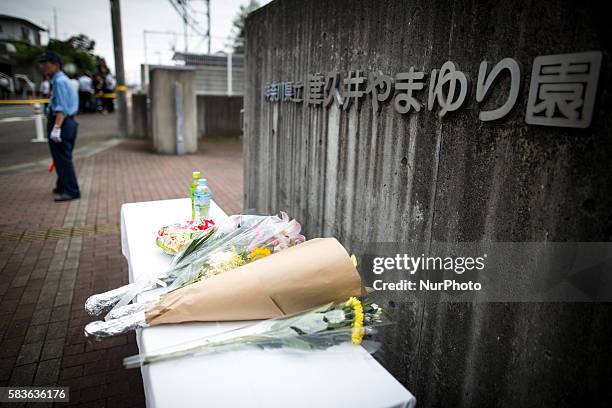 Flower and offering is seen in front of the entrance of Tsukui Yamayuri-en building at Sagamihara on Wednesday, July 27, 2016 in Kanagawa prefecture,...