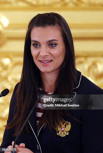 Russian pole vaulter Yelena Isinbayeva speaks during a meeting with the Russian national Olympic team, including those prohibited to participate Rio...