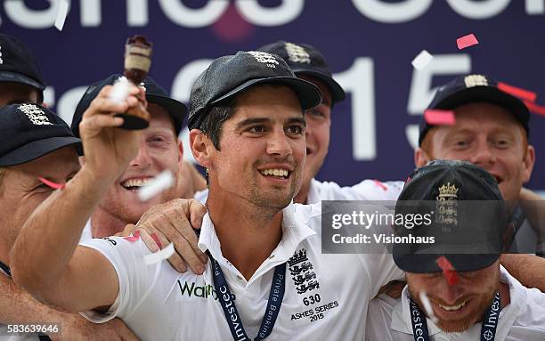 England Captain Alastair Cook raises the Ashes urn during the fourth day of the 5th Investec Ashes Test between England and Australia at The Kia Oval...