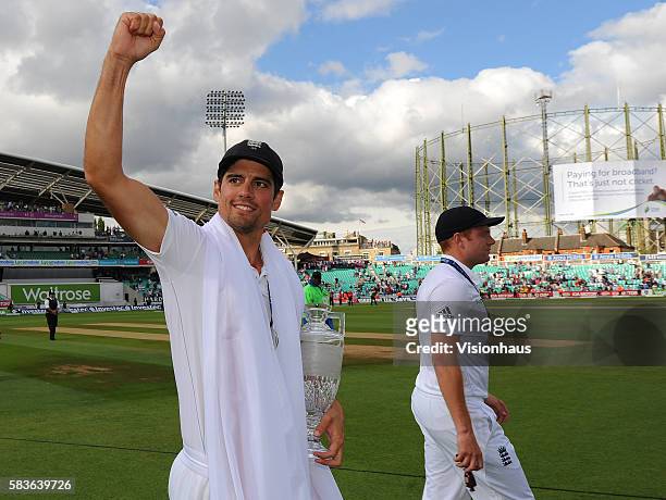 England Captain Alastair Cook celebrates winning The Ashes during the fourth day of the 5th Investec Ashes Test between England and Australia at The...
