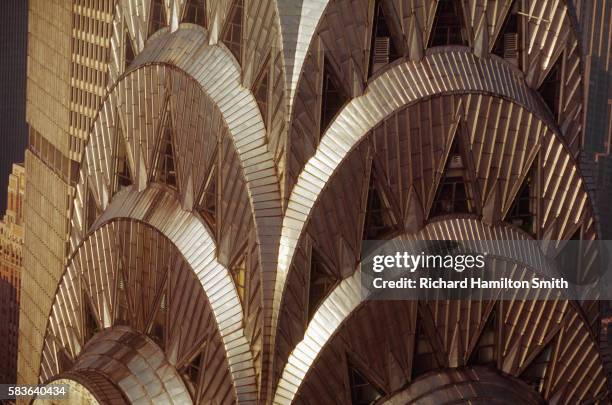 metal plating on chrysler building tower, manhattan - chrysler building photos et images de collection