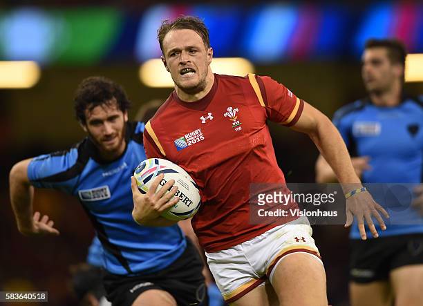 Cory Allen of Wales breaks through during the Rugby World Cup pool A group match between Wales and Uruguay at the Millennium Stadium in Cardiff,...