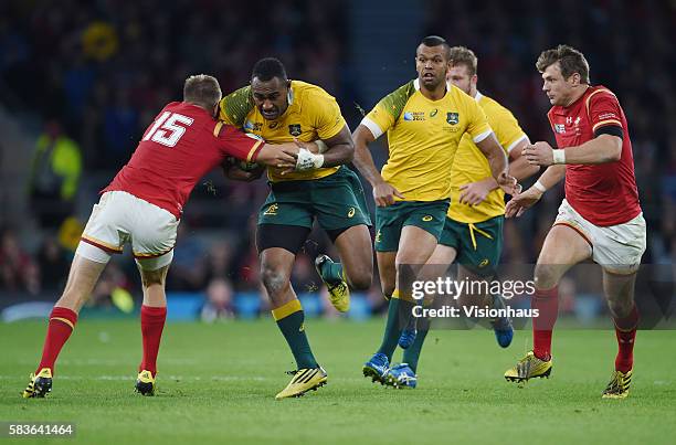 Tevita Kuridrani of Australia is tackled by Gareth Anscombe of Wales during the Rugby World Cup 2015 Group A match between Australia and Wales at...