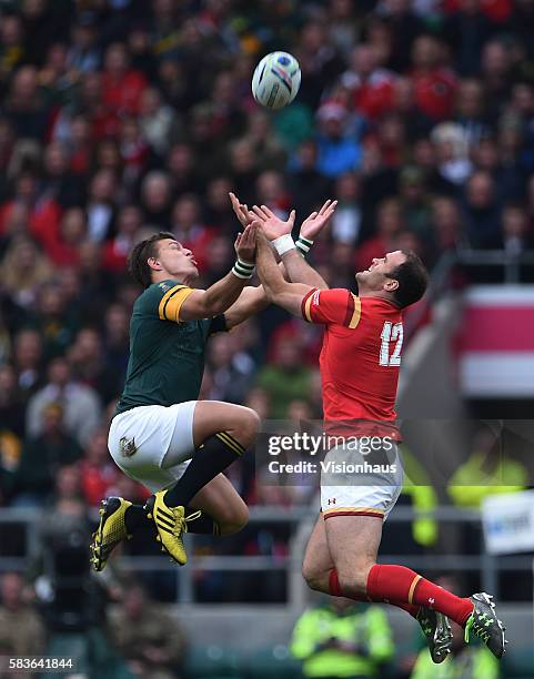 Handre Pollard of South Africa and Jame Roberts of Wales during the Rugby World Cup 2015 Quarter-Final match between South Africa and Wales at...