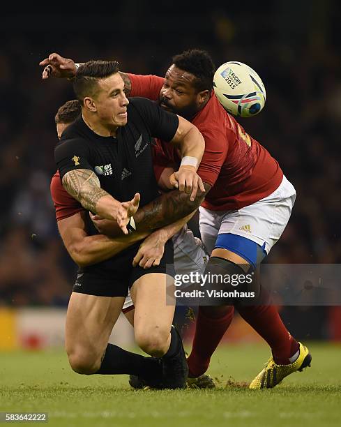 Sonny Bill Williams of New Zealand lays the ball off during the Rugby World Cup quarter final match between New Zealand and France at the Millennium...